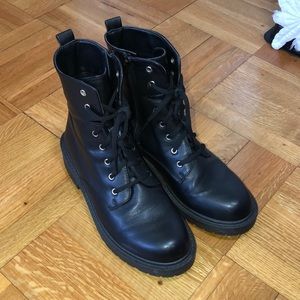 Black faux leather combat boots
